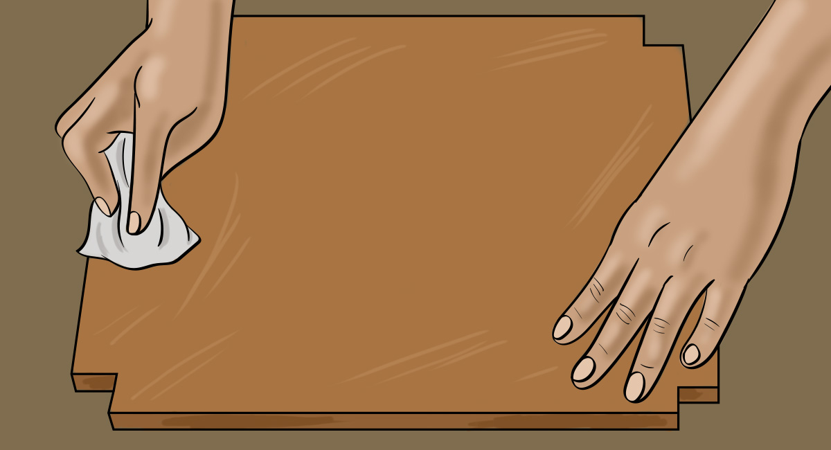 Cómo teñir madera - Paso 2: Levantar la veta limpiando las superficies con un paño húmedo